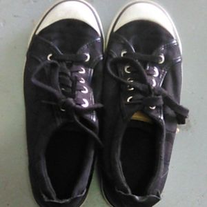 Black and white coach shoes size 8 1/2B